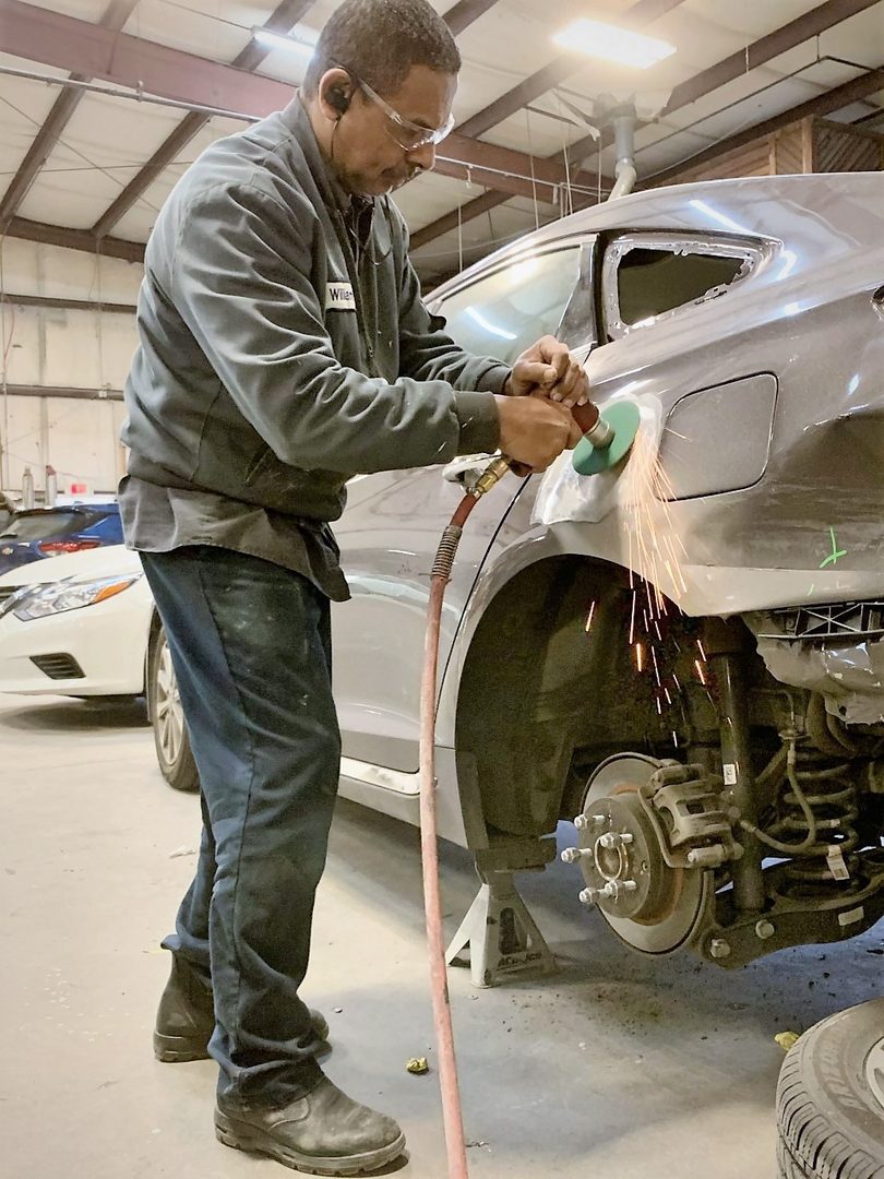 Prime technician finishing a panel